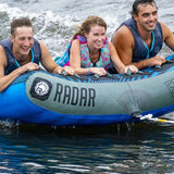 Radar Edge 3 Inflatable Towable Tube 2022 - Blue tube with black and white logo on top, floating in water.