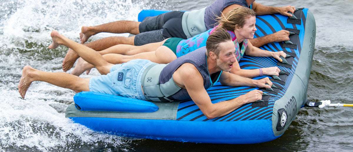 Radar Edge 3 Inflatable Towable Tube 2022 - Blue tube with black stripes and gray accents, featuring a circular logo on the front.