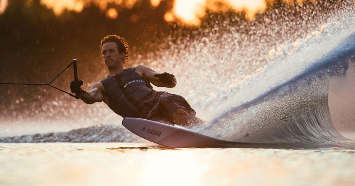 Radar Vapor Pro Build Slalom Waterski 2022 - A waterski with a sleek, aerodynamic design and a glossy finish.