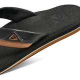 Reef Cushion Dawn Sandal 2022 - A pair of black sandals with a tan sole and strap.
