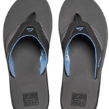 Reef Men's Fanning Sandal - A pair of brown sandals with a strap and toe post, featuring a logo on the top strap.