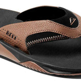 Reef Men's Fanning Sandal - A brown sandal with a strap and logo on top of the footbed.