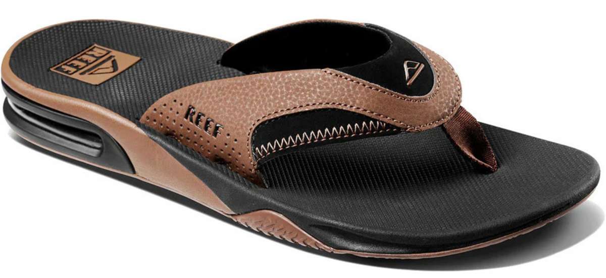 Reef Men's Fanning Sandal - A brown sandal with a strap and logo on top of the footbed.