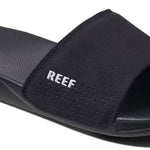 Reef One Slide 2022 - Black slide with a textured footbed and embossed logo on the strap.