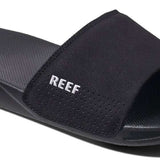 Reef One Slide 2022 - Black slide with a textured footbed and embossed logo on the strap.