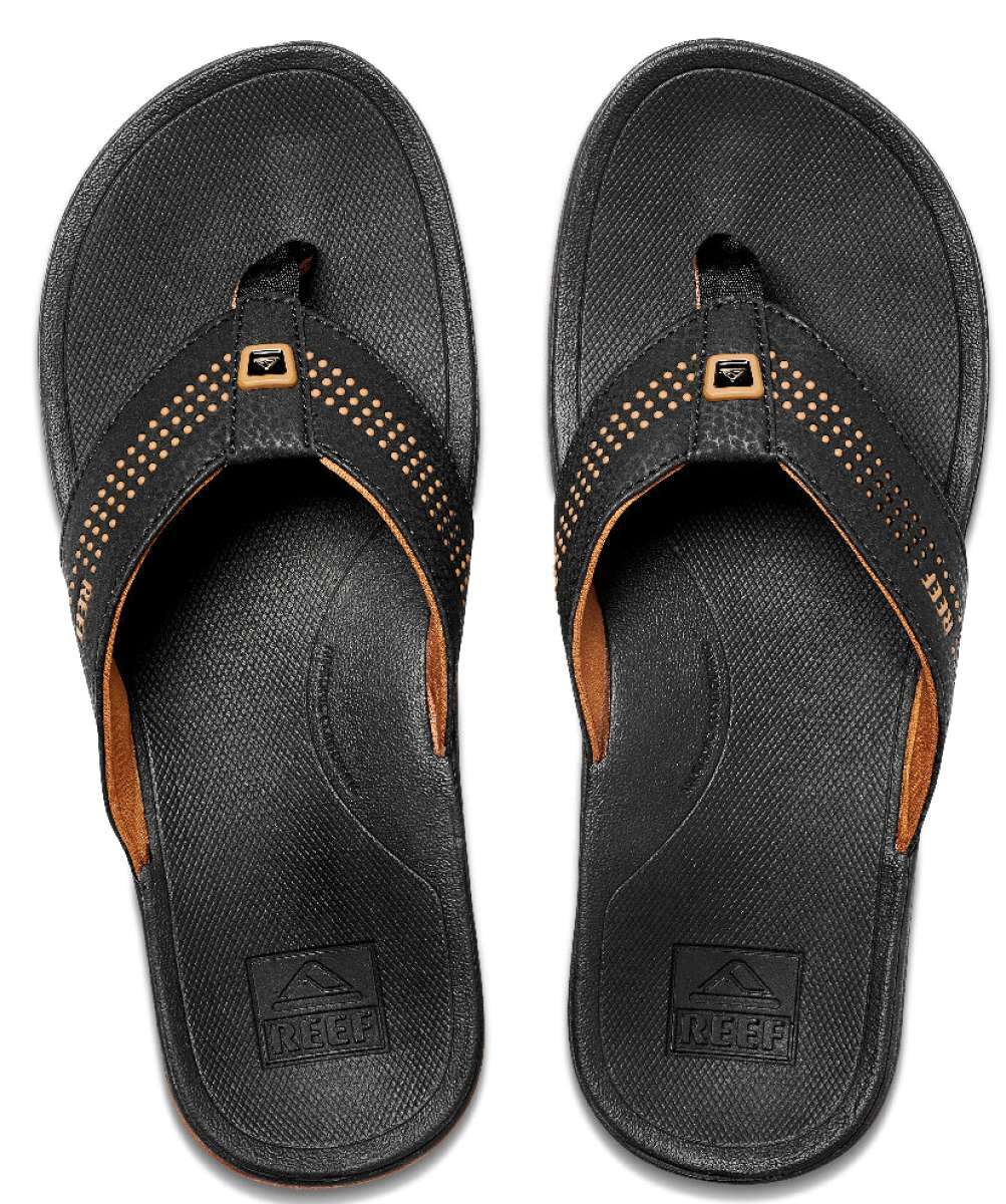 Reef Ortho-Seas Sandal - A pair of black sandals with a strap across the top and a small logo on it.