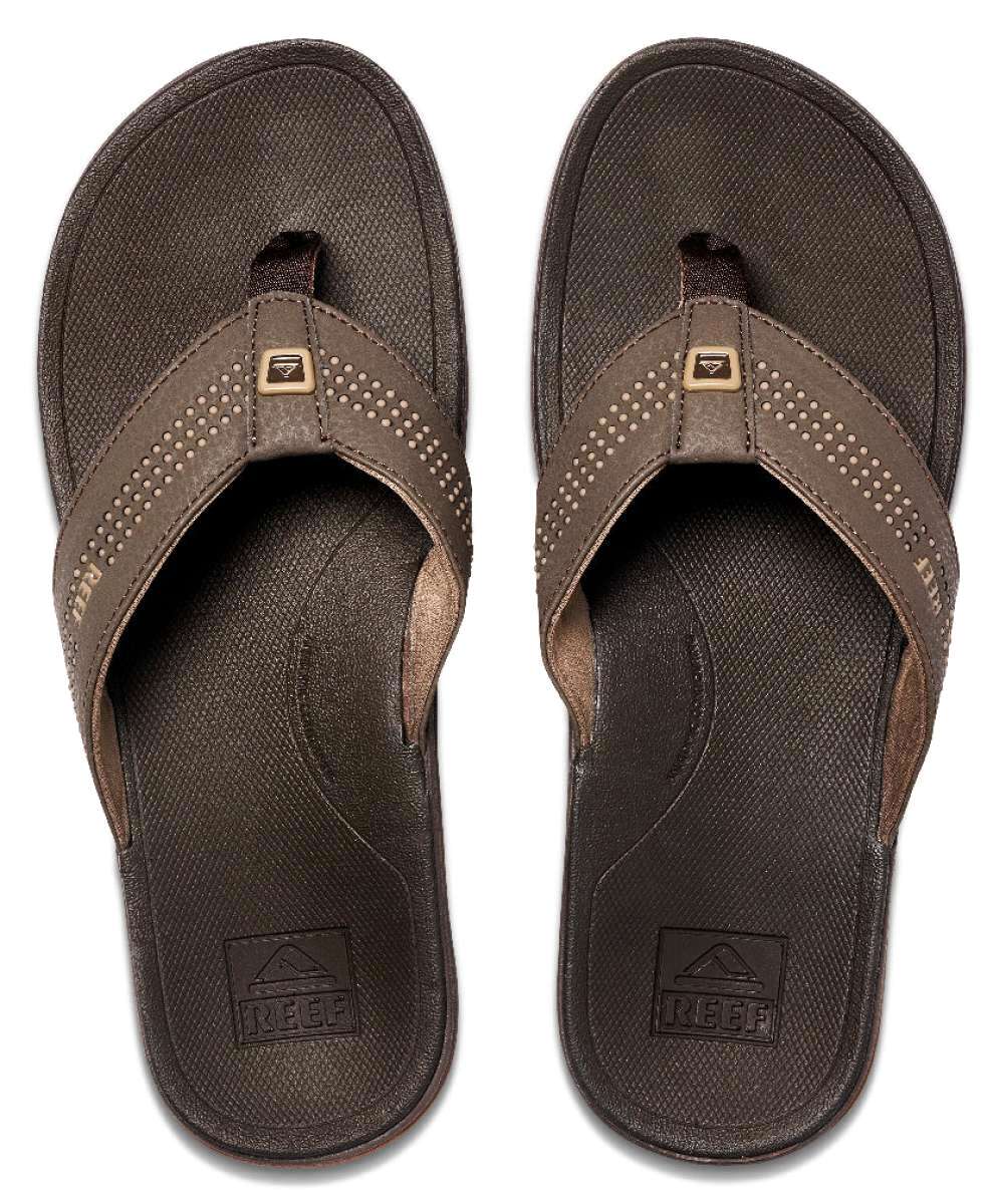 Reef Ortho-Seas Sandal - A pair of brown sandals with a strap and toe post, featuring a small logo on the top strap.