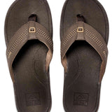 Reef Ortho-Seas Sandal - A pair of brown sandals with a strap and toe post, featuring a small logo on the top strap.