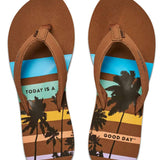 Reef Women's X Life Is Good Sandal - A pair of brown sandals with a palm tree and sunset design on the straps.