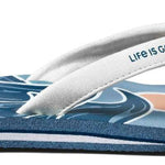 Reef Women's X Life Is Good Sandal - A pair of blue sandals with white straps and a peach-colored logo on the strap.