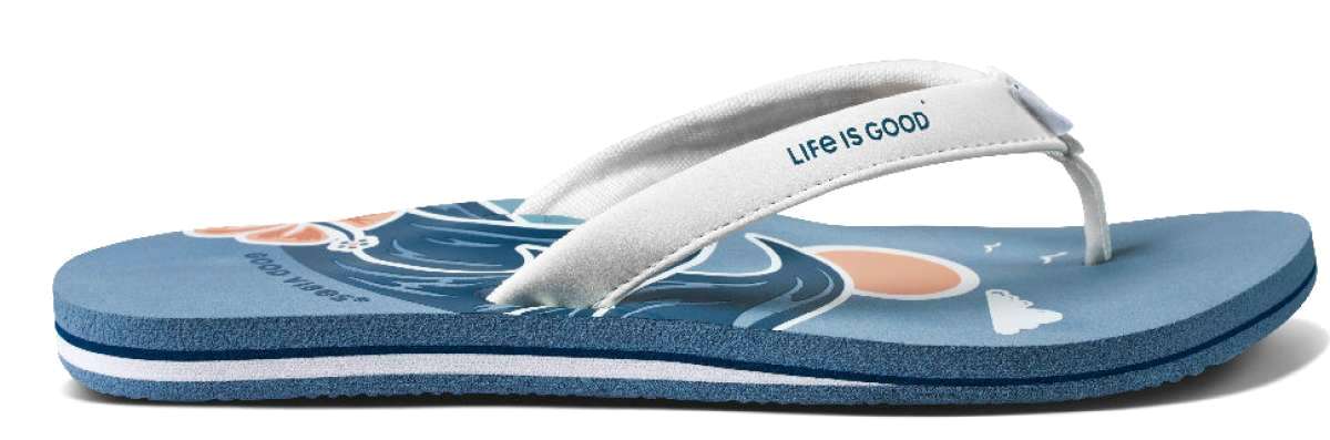 Reef Women's X Life Is Good Sandal - A pair of blue sandals with white straps and a peach-colored logo on the strap.
