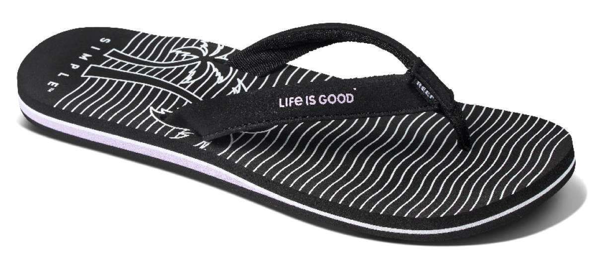 Reef Women's X Life Is Good Sandal - A black sandal with white stripes and a palm tree design on the strap.