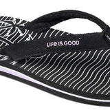 Reef Women's X Life Is Good Sandal - A black sandal with white stripes and a palm tree design on the strap.