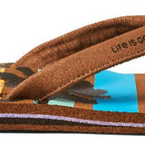 Reef Women's X Life Is Good Sandal - A pair of brown sandals with a palm tree design on top.