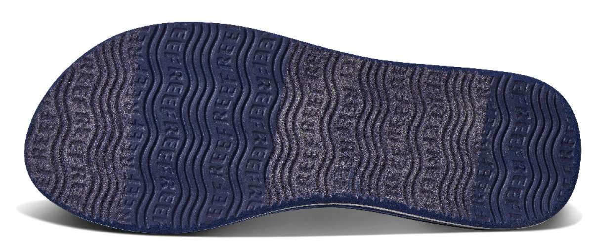 Reef Women's X Life Is Good Sandal - A pair of navy-blue sandals with white straps and a logo on the strap.