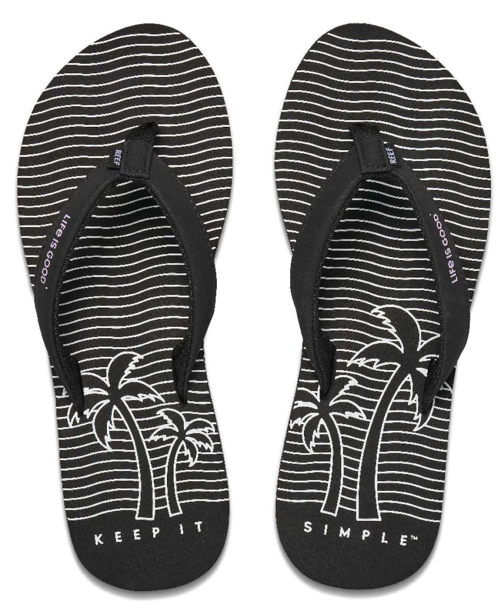 Reef Women's X Life Is Good Sandal - Black sandals with white stripes and palm tree logo on strap.