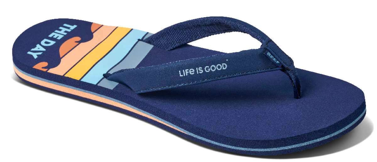 Reef Women's X Life Is Good Sandal - A pair of navy blue sandals with a light orange logo on the strap.