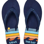 Reef Women's X Life Is Good Sandal - A pair of navy blue sandals with a yellow logo on the strap.