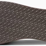 Reef Women's Zen Love Sandal 2020 - A brown sandal with a woven strap and a small, circular logo on the side.