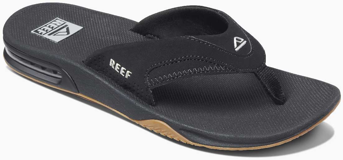 Reef Men's Fanning Sandal 2020 - A pair of black sandals with a white logo on the strap.