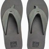 Reef Men's Fanning Sandal - A pair of gray sandals with a strap and toe post, featuring a small logo on the top strap.