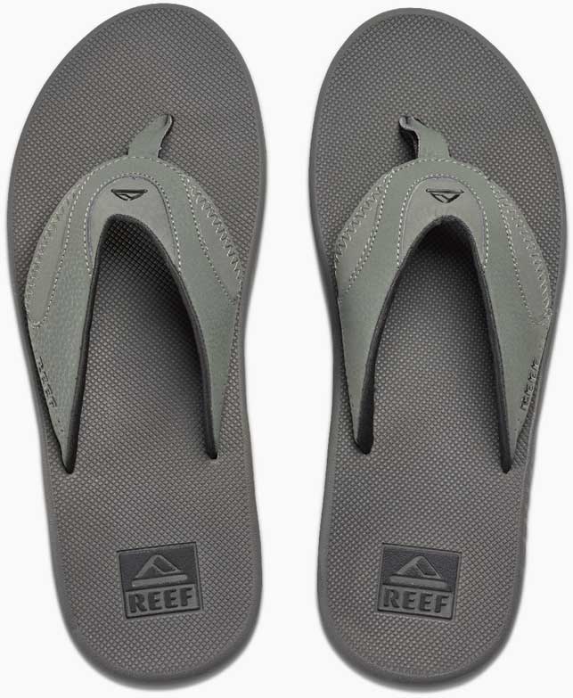 Reef Men's Fanning Sandal - A pair of gray sandals with a strap and toe post, featuring a small logo on the top strap.