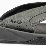 Reef Men's Fanning Sandal 2020 - A pair of gray sandals with a strap and toe post, featuring a textured pattern on the footbed.
