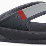 Reef Men's Fanning Low Sandal 2020 - A gray sandal with a red stripe on the strap.