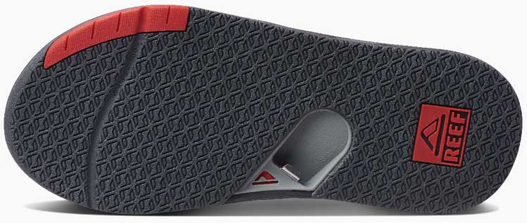 Reef Men's Fanning Low Sandal 2020 - A gray sandal with a red strap on top.