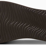 Reef Women's Bliss-Full Sandal - A brown sandal with a thick sole and wavy pattern on the bottom.