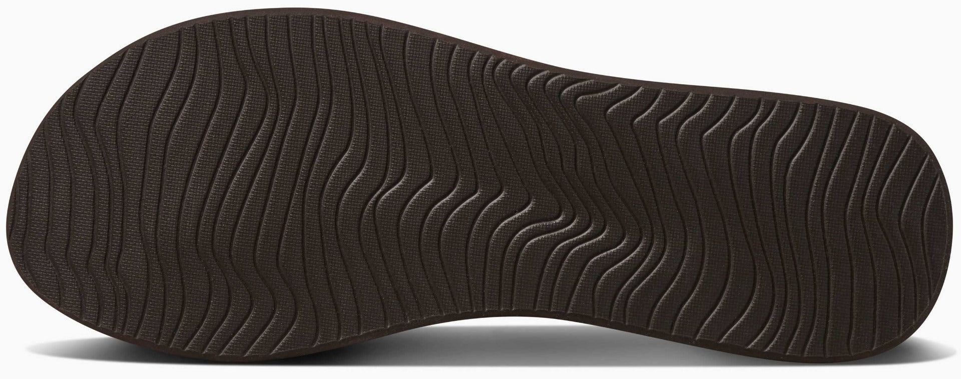 Reef Women's Bliss-Full Sandal - A brown sandal with a thick sole and wavy pattern on the bottom.