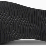 Reef Women's Bliss-Full Sandal - A black sandal with a textured sole and a strap that wraps around the ankle.