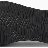 Reef Women's Bliss-Full Sandal - A black sandal with a textured sole and a strap that wraps around the ankle.