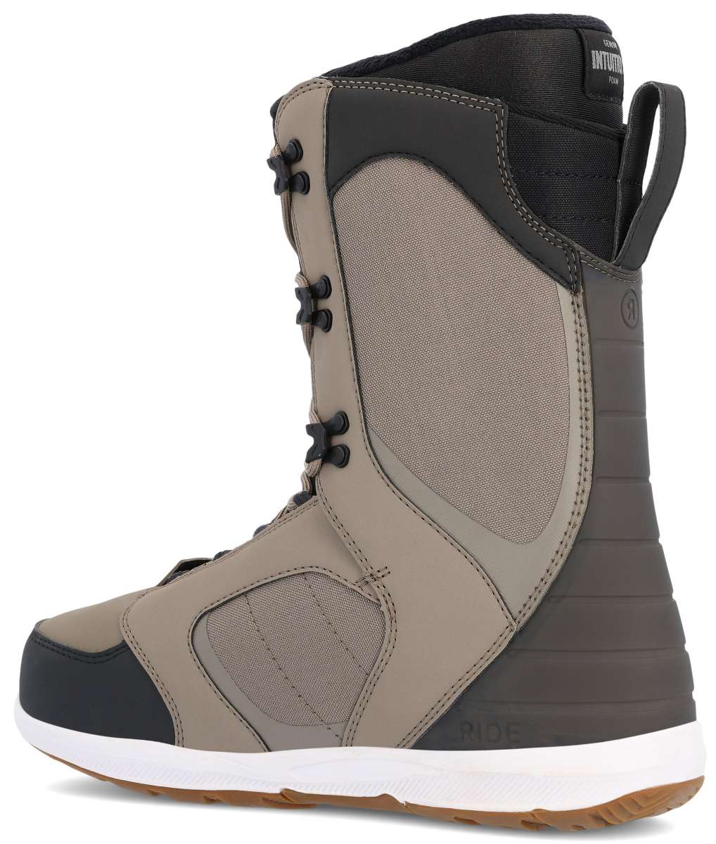 Ride Anchor Snowboard Boot 2023 - A tan snowboard boot with a black toe cap and laces, featuring a mesh panel on the side.