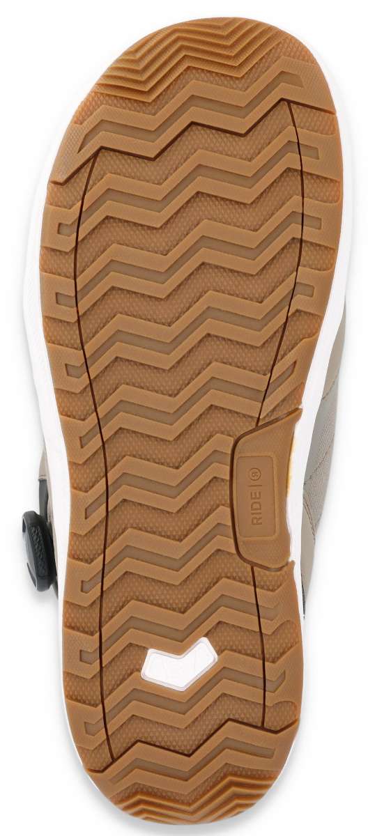 Ride Anchor Snowboard Boot 2023 - A pair of snowboard boots with a black strap and silver buckle on the side.