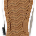 Ride Anchor Snowboard Boot 2023 - A pair of snowboard boots with a black strap and silver buckle on the side.