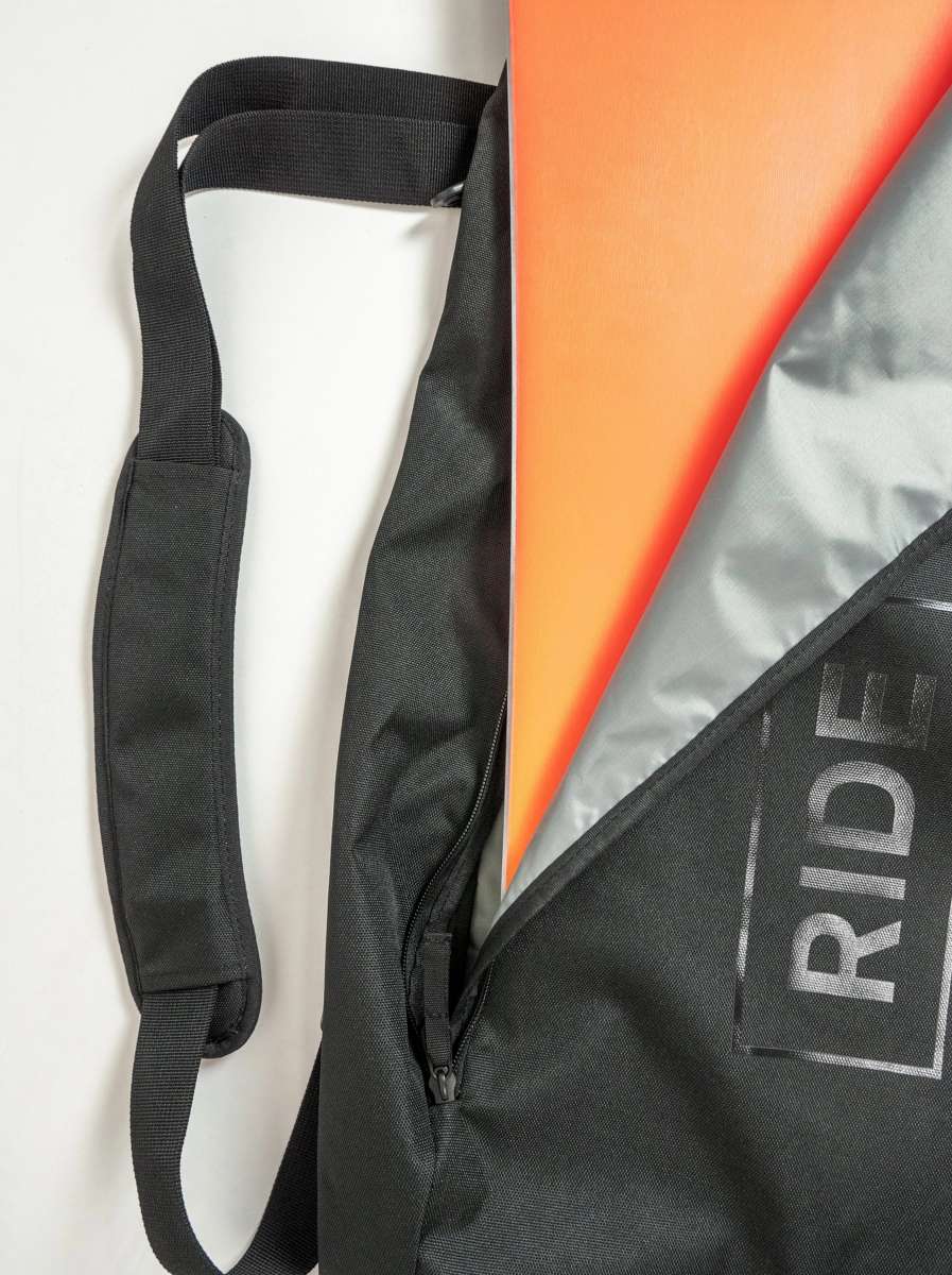 Ride Blackened Board Bag 2023 - A black bag with a zipper on the front, featuring a white logo that says "RIDE" in bold letters.