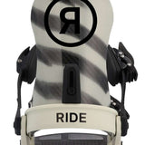 Ride C-10 Snowboard Binding 2023 - A black snowboard binding with a circular logo featuring a stylized "R" in the center, set against a white background.