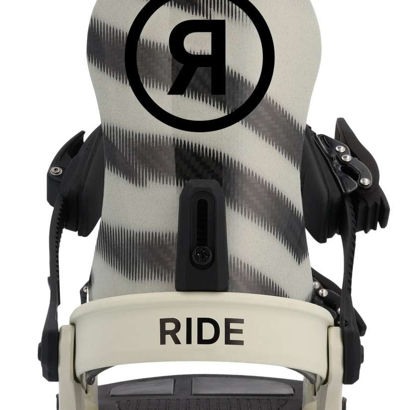 Ride C-10 Snowboard Binding 2023 - A black snowboard binding with a circular logo featuring a stylized "R" in the center, set against a white background.