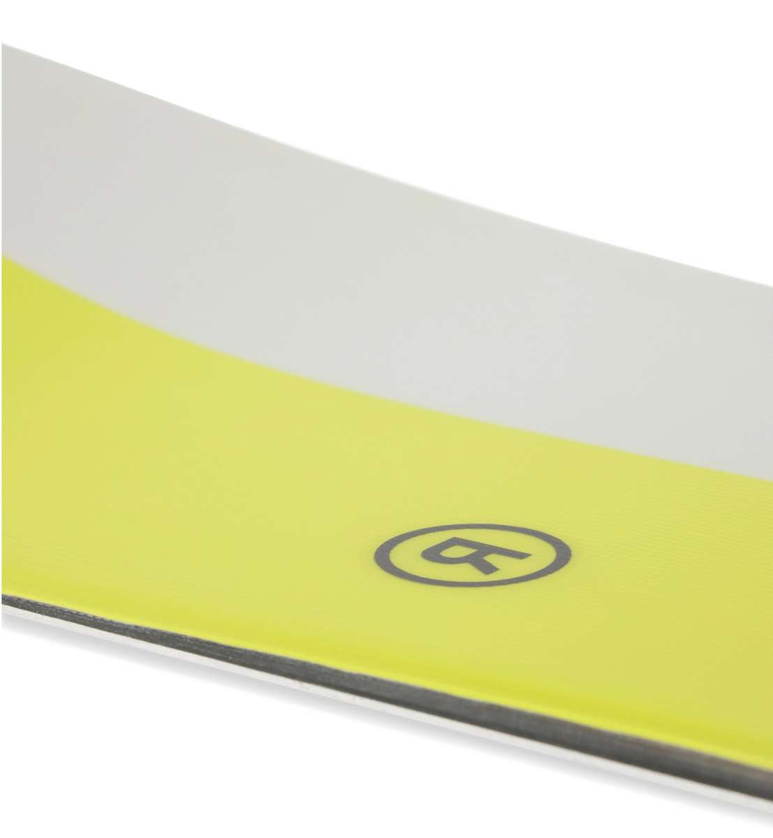 Ride Women's Compact Snowboard 2023 - A snowboard with a yellow base and gray top sheet, featuring a circular logo in the center of the top sheet.