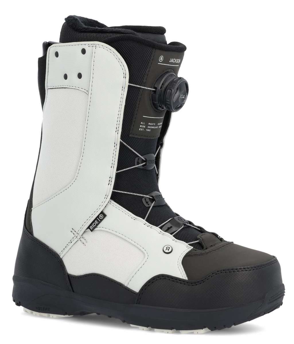 Ride Jackson Snowboard Boot 2023 - Black snowboard boots with white accents and a black strap on top of the tongue.