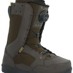 Ride Jackson Snowboard Boot 2024 - A brown snowboard boot with a black strap and laces, featuring a yellow logo on the side.