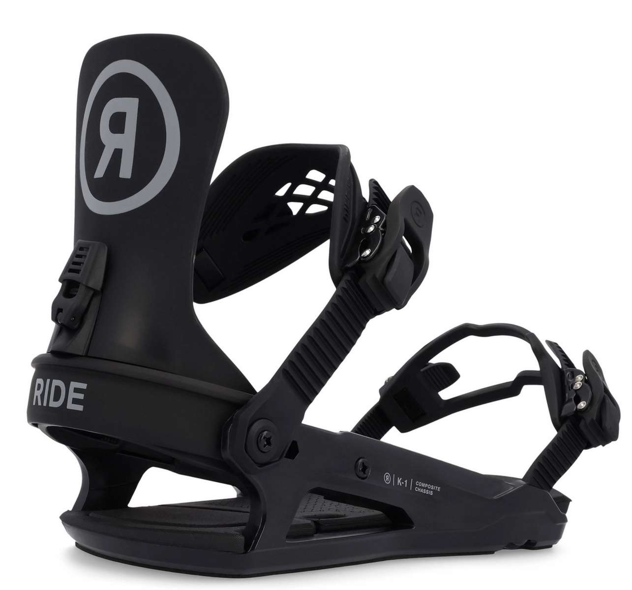 Ride Junior K-1 Snowboard Binding 2023 - A black snowboard binding with a white logo featuring a stylized "R" inside a circle on top of the left boot strap.