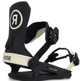 Ride Women's CL-6 Snowboard Binding 2023 - A black and white snowboard binding with a circular logo featuring a stylized "R" in the center, on the top of the left boot strap.