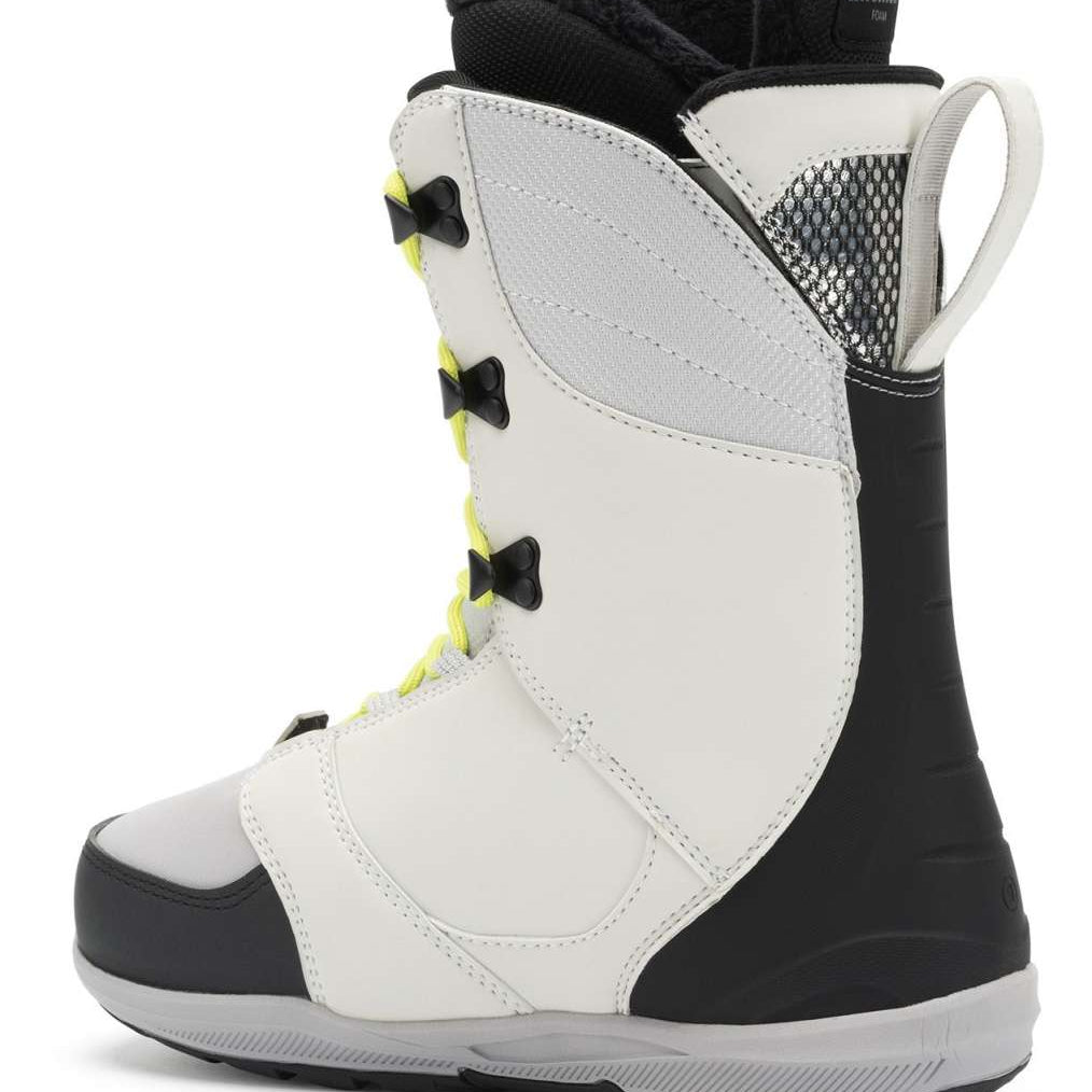 Ride Ladies Context Snowboard Boot 2022 - A white snowboard boot with black accents and yellow laces, featuring a textured pattern on the side.