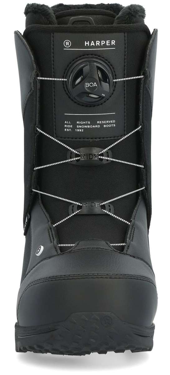 Ride Women's Harper Snowboard Boots 2024 - Black snowboard boots with a round black dial on the side and white stitching.