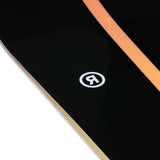 Ride Women's Heartbreaker Snowboard 2024 - A black snowboard with a white heart design on top of a brown background.