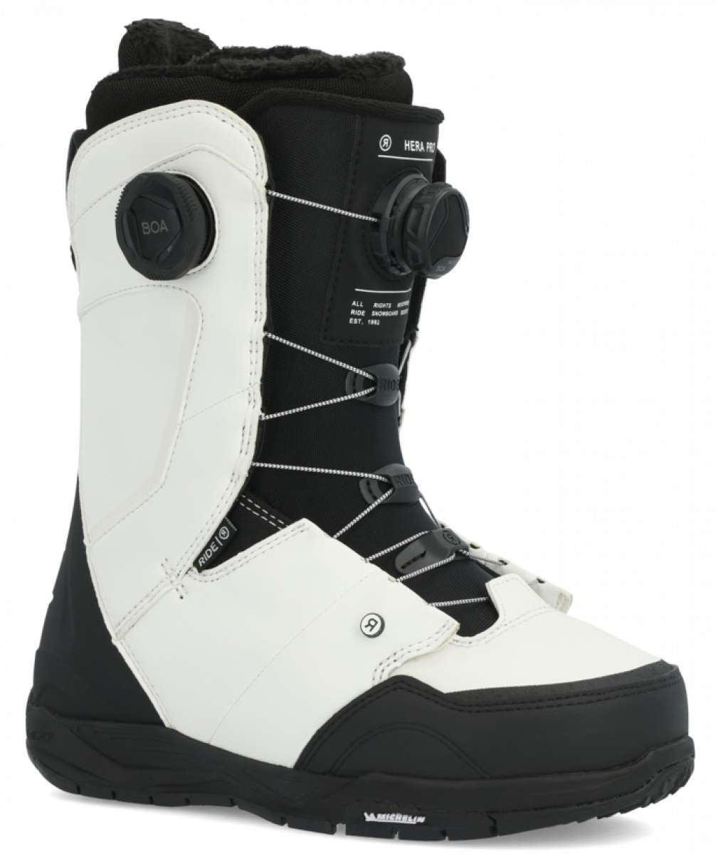 Ride Women's Hera Pro Snowboard Boot 2024 - Black snowboard boot with white accents and a black BOA dial on the side.