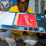 Ride Russell X Algoryhythm LTD Snowboard 2024 - A snowboard with a predominantly black base and white accents, featuring a distinctive Algorythm logo on top.