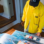 Ride Russell X Algoryhythm LTD Snowboard 2024 - A snowboard with a predominantly white base and blue accents, featuring a distinctive "Algorythym" logo on its top side.